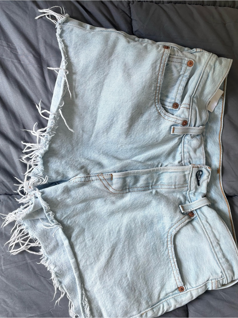 Levi's Light Blue Frayed Hem Cropped Denim Shorts
